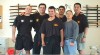 Sigung Brian Yoshii and black belts at promotion (1999)